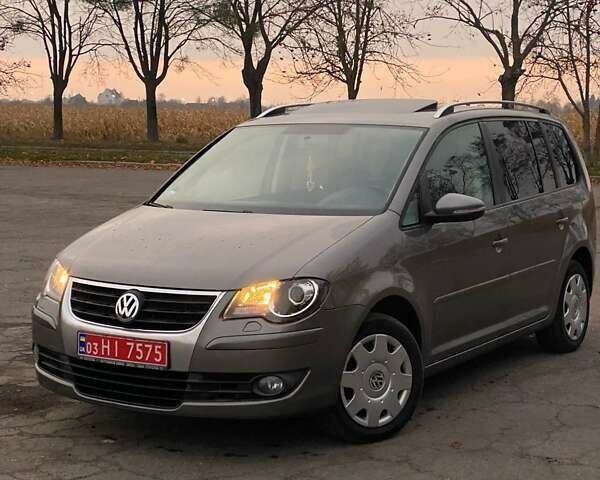 Сірий Фольксваген Туран, об'ємом двигуна 1.4 л та пробігом 174 тис. км за 6999 $, фото 1 на Automoto.ua