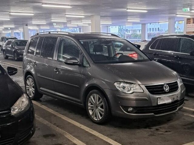 Серый Фольксваген Туран, объемом двигателя 1.4 л и пробегом 216 тыс. км за 4300 $, фото 1 на Automoto.ua