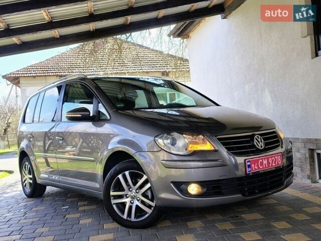 Сірий Фольксваген Туран, об'ємом двигуна 1.4 л та пробігом 240 тис. км за 6999 $, фото 1 на Automoto.ua