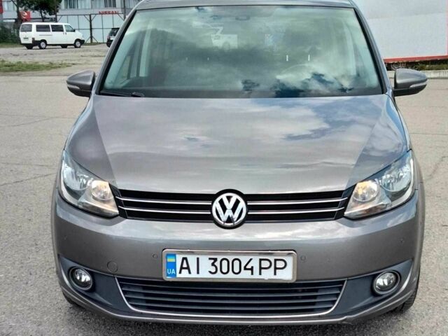Серый Фольксваген Туран, объемом двигателя 1.4 л и пробегом 223 тыс. км за 9500 $, фото 1 на Automoto.ua