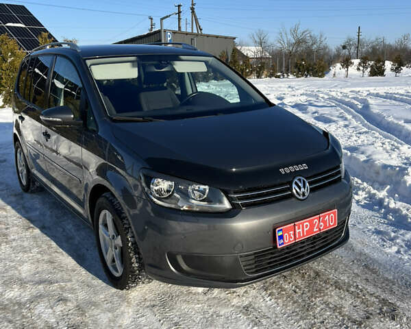 Сірий Фольксваген Туран, об'ємом двигуна 1.39 л та пробігом 209 тис. км за 8799 $, фото 1 на Automoto.ua