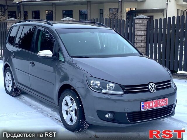 Серый Фольксваген Туран, объемом двигателя 1.4 л и пробегом 204 тыс. км за 9700 $, фото 1 на Automoto.ua