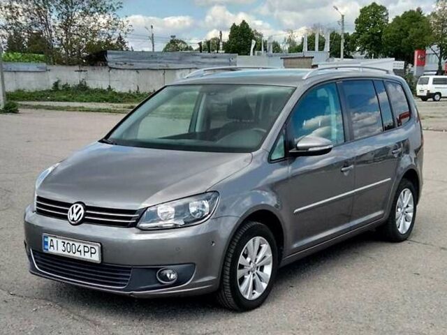 Серый Фольксваген Туран, объемом двигателя 1.4 л и пробегом 223 тыс. км за 9500 $, фото 1 на Automoto.ua