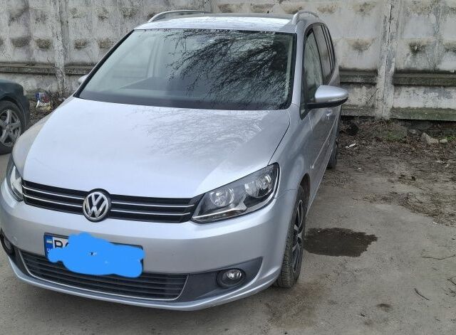 Сірий Фольксваген Туран, об'ємом двигуна 2 л та пробігом 263 тис. км за 10500 $, фото 1 на Automoto.ua