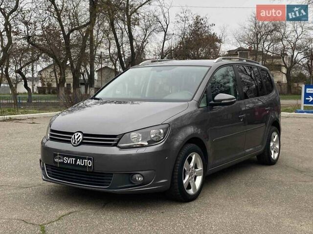 Серый Фольксваген Туран, объемом двигателя 1.39 л и пробегом 174 тыс. км за 10200 $, фото 1 на Automoto.ua