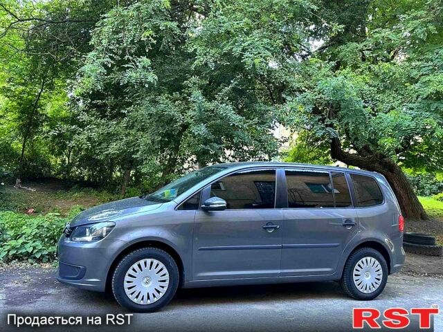 Сірий Фольксваген Туран, об'ємом двигуна 1.6 л та пробігом 310 тис. км за 8355 $, фото 1 на Automoto.ua