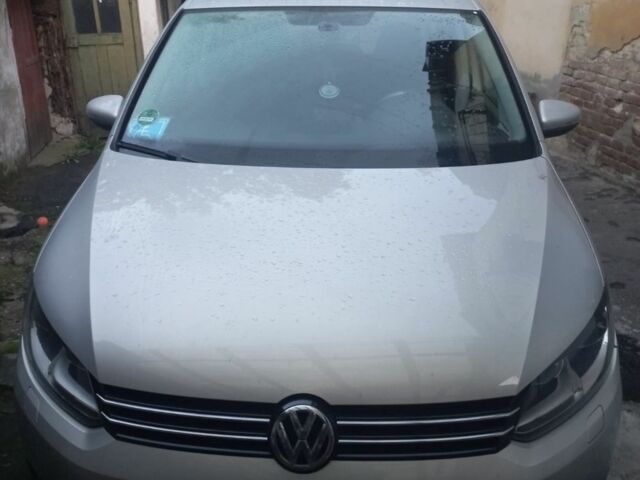 Серый Фольксваген Туран, объемом двигателя 1.4 л и пробегом 200 тыс. км за 12880 $, фото 1 на Automoto.ua