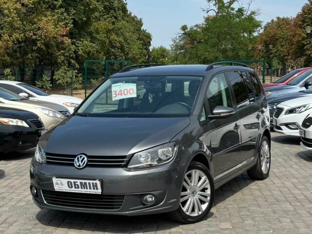 Сірий Фольксваген Туран, об'ємом двигуна 1.4 л та пробігом 213 тис. км за 9400 $, фото 1 на Automoto.ua