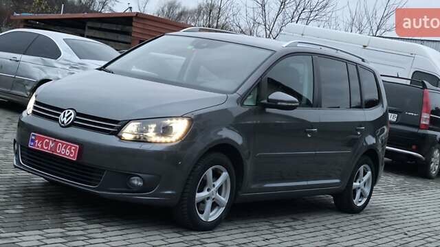 Серый Фольксваген Туран, объемом двигателя 1.4 л и пробегом 194 тыс. км за 9700 $, фото 1 на Automoto.ua