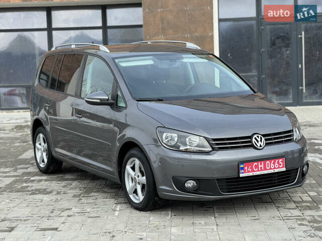 Серый Фольксваген Туран, объемом двигателя 1.4 л и пробегом 221 тыс. км за 10999 $, фото 1 на Automoto.ua