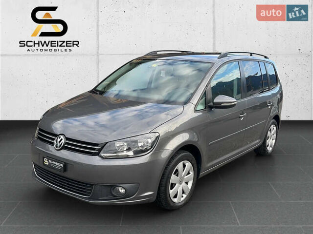 Серый Фольксваген Туран, объемом двигателя 2 л и пробегом 220 тыс. км за 14200 $, фото 1 на Automoto.ua