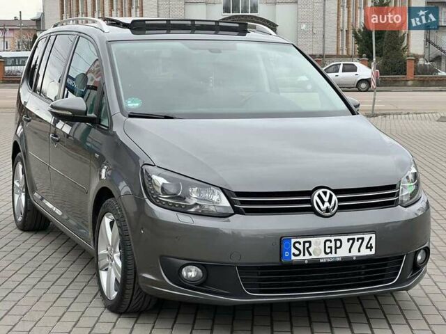 Серый Фольксваген Туран, объемом двигателя 2 л и пробегом 167 тыс. км за 14650 $, фото 1 на Automoto.ua
