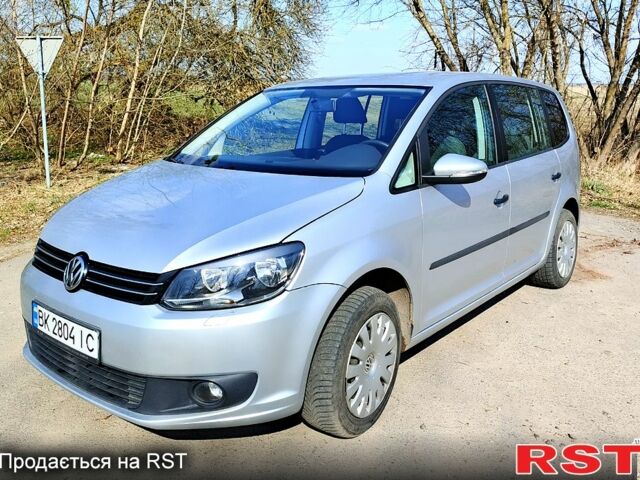 Серый Фольксваген Туран, объемом двигателя 1.6 л и пробегом 251 тыс. км за 11600 $, фото 1 на Automoto.ua