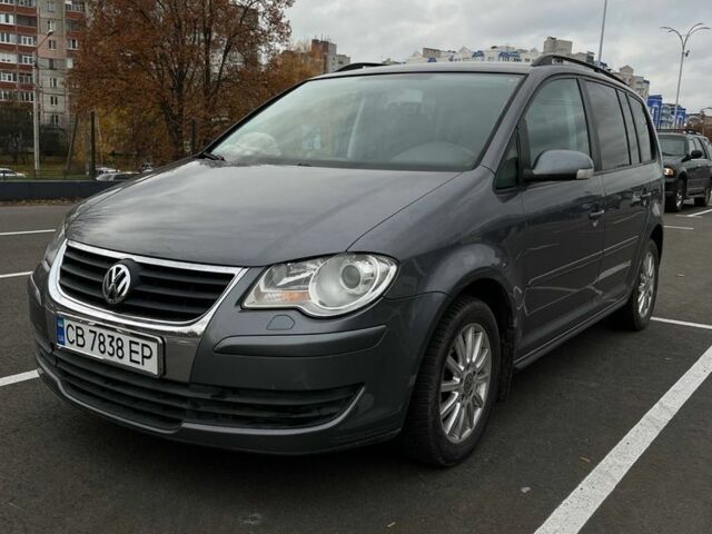 Серый Фольксваген Туран, объемом двигателя 1.4 л и пробегом 192 тыс. км за 6300 $, фото 1 на Automoto.ua