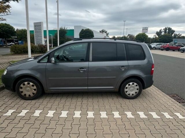 Серый Фольксваген Туран, объемом двигателя 1.9 л и пробегом 312 тыс. км за 2323 $, фото 1 на Automoto.ua