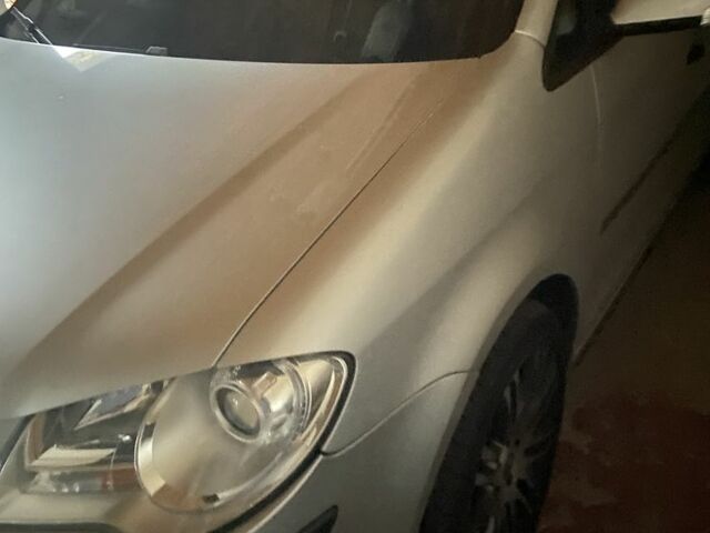 Серый Фольксваген Туран, объемом двигателя 1.4 л и пробегом 202 тыс. км за 5485 $, фото 1 на Automoto.ua