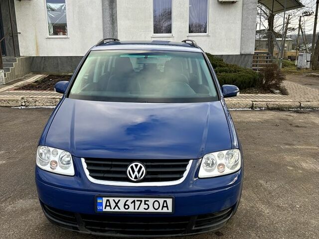 Синий Фольксваген Туран, объемом двигателя 1.6 л и пробегом 248 тыс. км за 5500 $, фото 1 на Automoto.ua