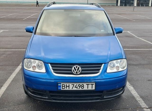 Синий Фольксваген Туран, объемом двигателя 1.6 л и пробегом 260 тыс. км за 5500 $, фото 1 на Automoto.ua