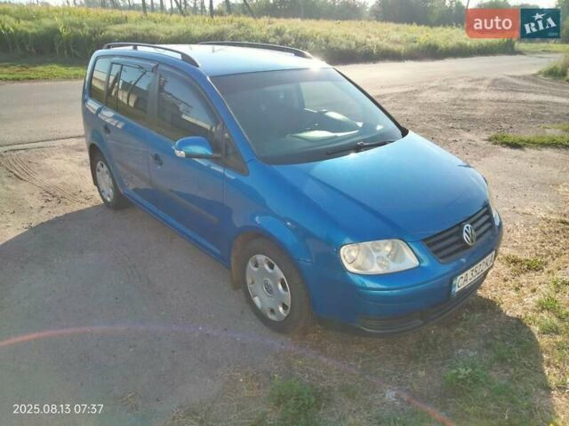 Синий Фольксваген Туран, объемом двигателя 1.6 л и пробегом 259 тыс. км за 6000 $, фото 1 на Automoto.ua