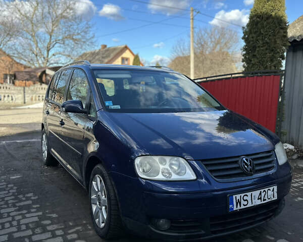 Синий Фольксваген Туран, объемом двигателя 1.9 л и пробегом 430 тыс. км за 2599 $, фото 1 на Automoto.ua