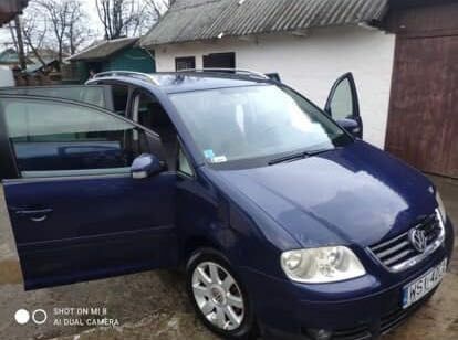 Синий Фольксваген Туран, объемом двигателя 1.9 л и пробегом 430 тыс. км за 2800 $, фото 1 на Automoto.ua