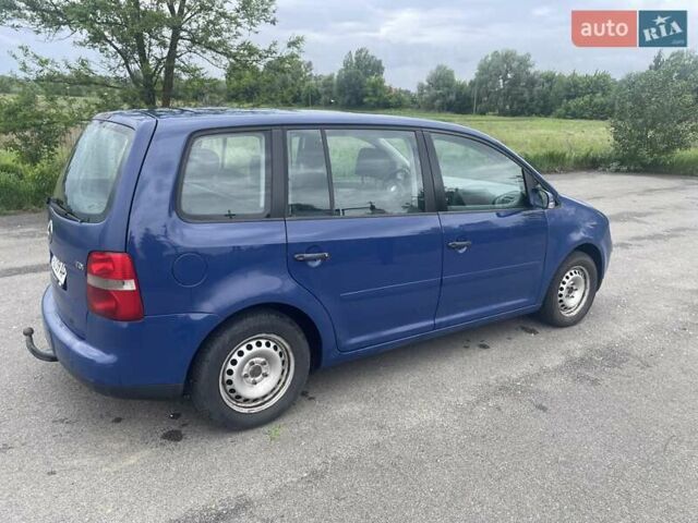 Синий Фольксваген Туран, объемом двигателя 1.9 л и пробегом 512 тыс. км за 4650 $, фото 1 на Automoto.ua