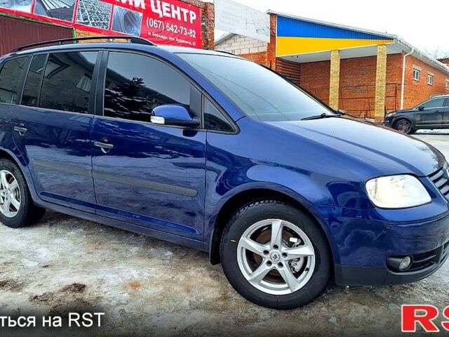 Синий Фольксваген Туран, объемом двигателя 1.6 л и пробегом 239 тыс. км за 5100 $, фото 1 на Automoto.ua