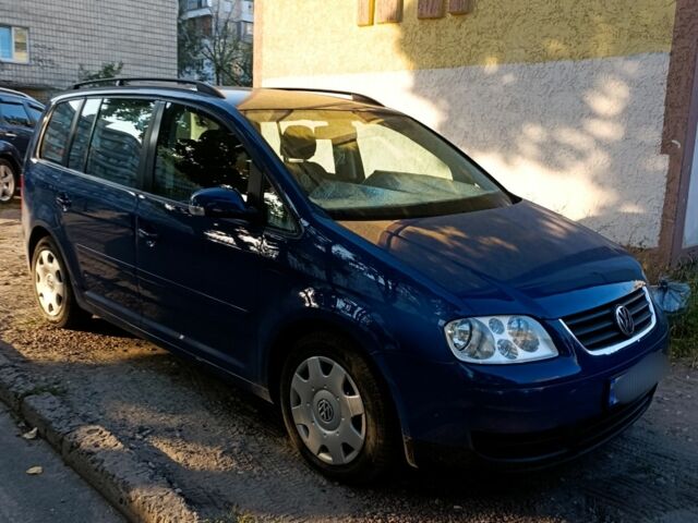 Синий Фольксваген Туран, объемом двигателя 1.6 л и пробегом 205 тыс. км за 5350 $, фото 1 на Automoto.ua