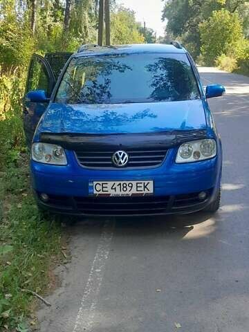 Синий Фольксваген Туран, объемом двигателя 1.6 л и пробегом 213 тыс. км за 5600 $, фото 1 на Automoto.ua