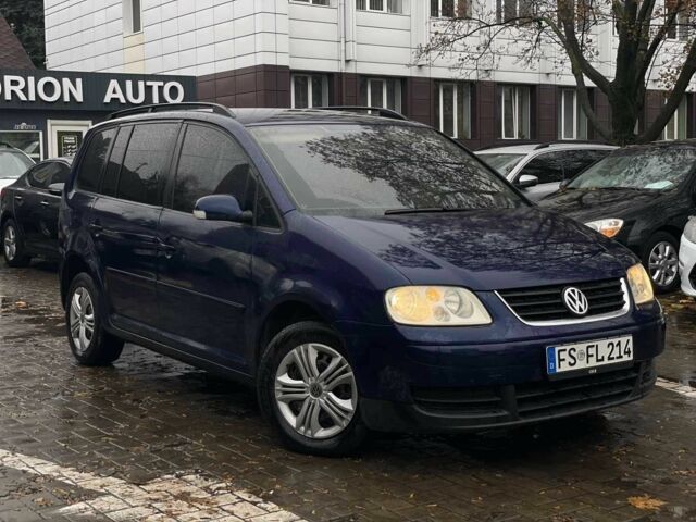Синий Фольксваген Туран, объемом двигателя 1.9 л и пробегом 228 тыс. км за 3999 $, фото 1 на Automoto.ua