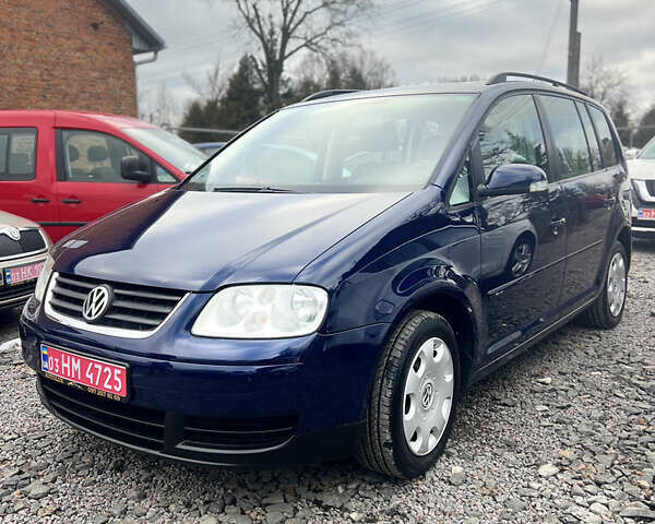 Синий Фольксваген Туран, объемом двигателя 1.6 л и пробегом 263 тыс. км за 5700 $, фото 1 на Automoto.ua