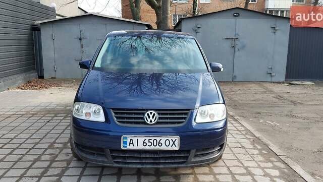 Синій Фольксваген Туран, об'ємом двигуна 1.6 л та пробігом 203 тис. км за 6000 $, фото 1 на Automoto.ua