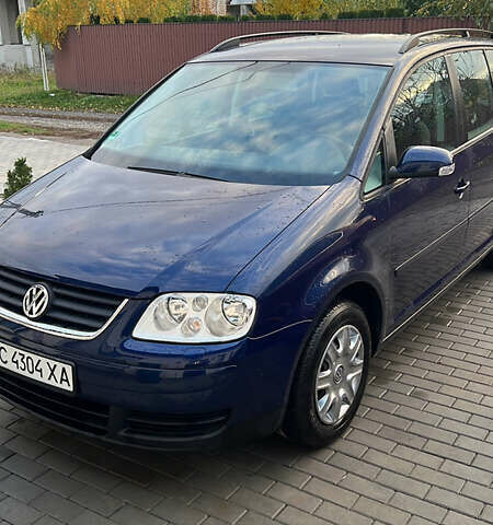 Синий Фольксваген Туран, объемом двигателя 1.6 л и пробегом 240 тыс. км за 6300 $, фото 1 на Automoto.ua