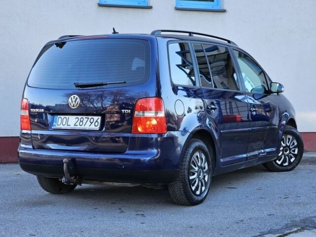 Синий Фольксваген Туран, объемом двигателя 1.9 л и пробегом 240 тыс. км за 1700 $, фото 1 на Automoto.ua
