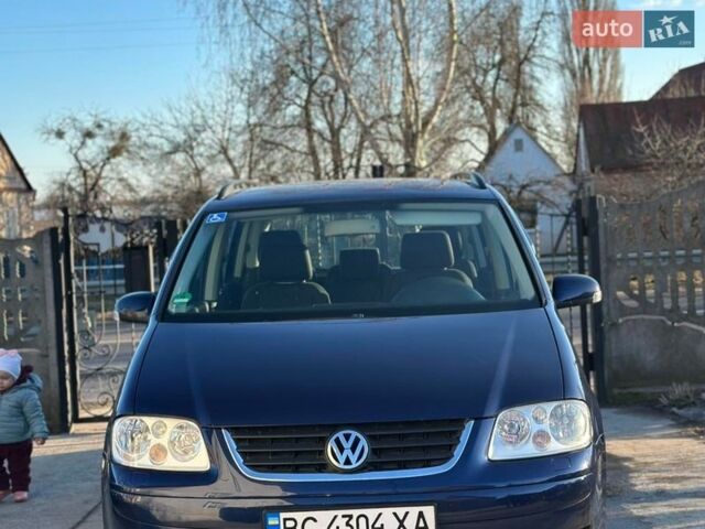 Синій Фольксваген Туран, об'ємом двигуна 1.6 л та пробігом 247 тис. км за 6000 $, фото 1 на Automoto.ua