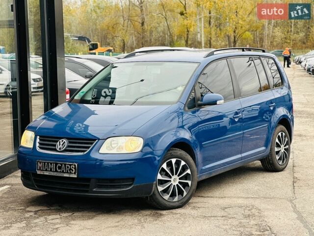 Синій Фольксваген Туран, об'ємом двигуна 1.6 л та пробігом 151 тис. км за 6199 $, фото 1 на Automoto.ua