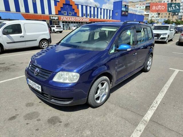 Синий Фольксваген Туран, объемом двигателя 1.6 л и пробегом 232 тыс. км за 4500 $, фото 1 на Automoto.ua
