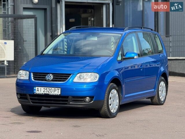 Синій Фольксваген Туран, об'ємом двигуна 1.6 л та пробігом 225 тис. км за 5650 $, фото 1 на Automoto.ua