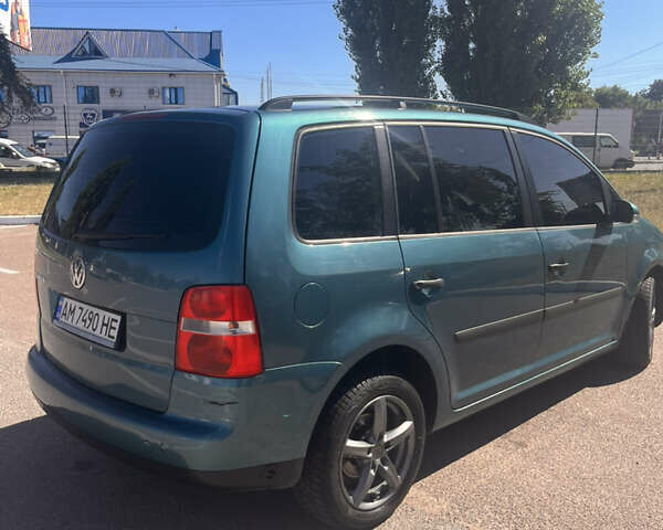 Синій Фольксваген Туран, об'ємом двигуна 1.6 л та пробігом 300 тис. км за 5000 $, фото 1 на Automoto.ua