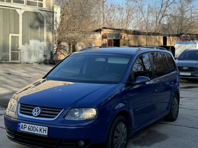 Синий Фольксваген Туран, объемом двигателя 1.6 л и пробегом 250 тыс. км за 4150 $, фото 1 на Automoto.ua