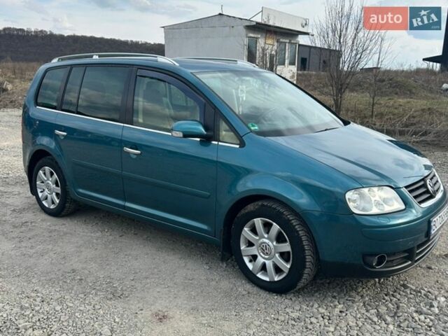 Синий Фольксваген Туран, объемом двигателя 1.97 л и пробегом 268 тыс. км за 6350 $, фото 1 на Automoto.ua
