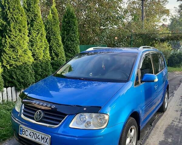 Синий Фольксваген Туран, объемом двигателя 1.97 л и пробегом 377 тыс. км за 6000 $, фото 1 на Automoto.ua