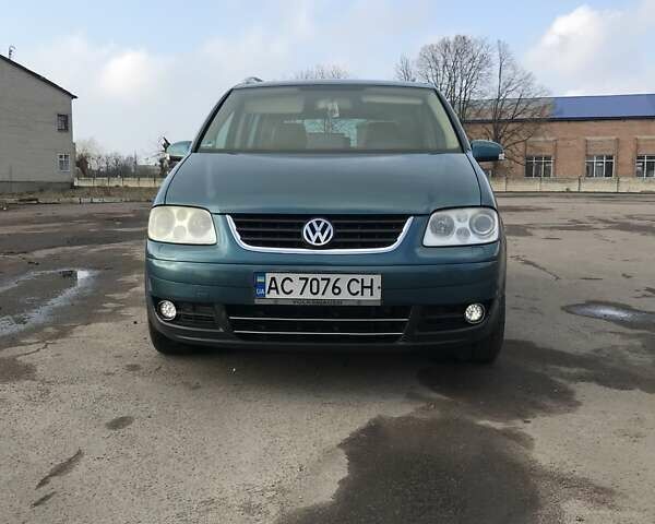 Синий Фольксваген Туран, объемом двигателя 1.97 л и пробегом 342 тыс. км за 7000 $, фото 1 на Automoto.ua