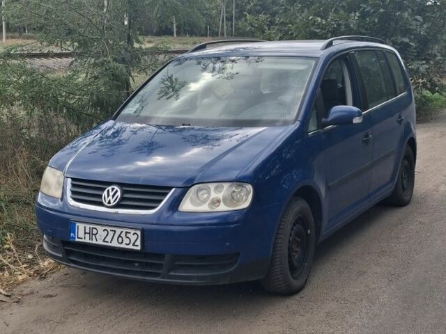 Синій Фольксваген Туран, об'ємом двигуна 1.6 л та пробігом 120 тис. км за 2456 $, фото 1 на Automoto.ua