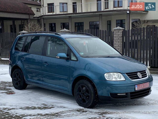 Синий Фольксваген Туран, объемом двигателя 1.6 л и пробегом 186 тыс. км за 6000 $, фото 1 на Automoto.ua