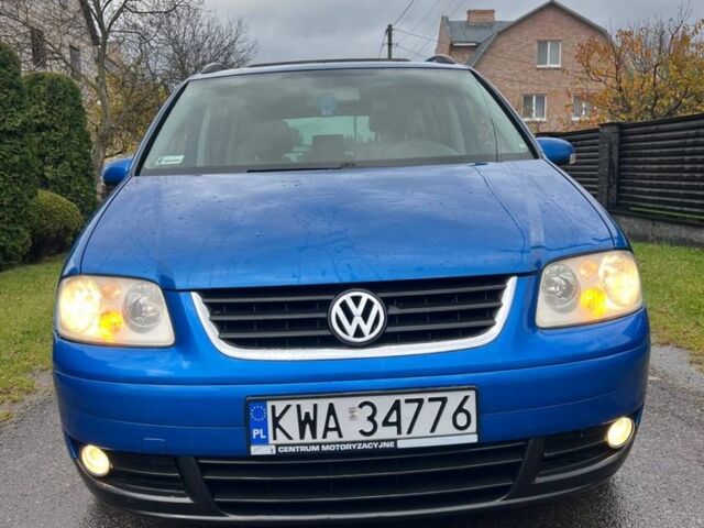 Синий Фольксваген Туран, объемом двигателя 1.9 л и пробегом 400 тыс. км за 2499 $, фото 1 на Automoto.ua