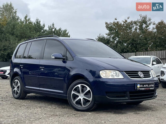 Синий Фольксваген Туран, объемом двигателя 1.6 л и пробегом 233 тыс. км за 6500 $, фото 1 на Automoto.ua