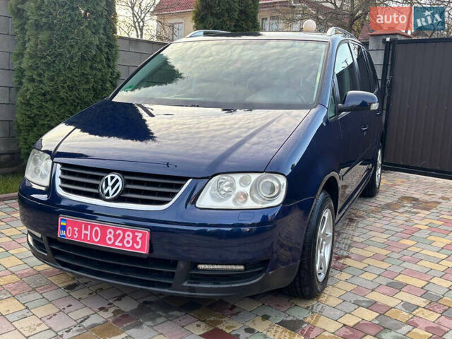 Синий Фольксваген Туран, объемом двигателя 1.6 л и пробегом 251 тыс. км за 6700 $, фото 1 на Automoto.ua