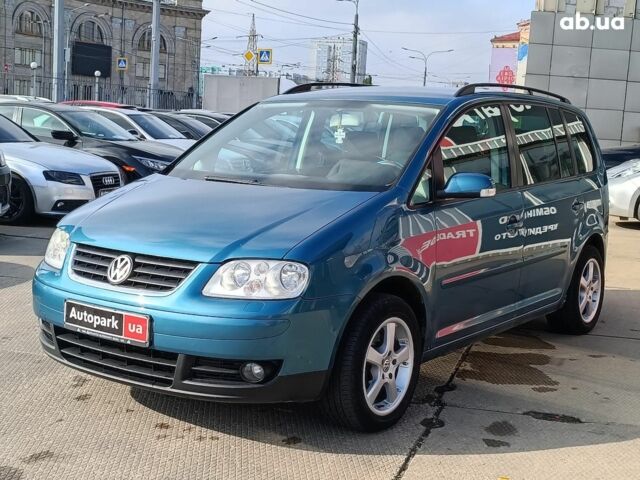Синий Фольксваген Туран, объемом двигателя 2 л и пробегом 320 тыс. км за 5490 $, фото 1 на Automoto.ua