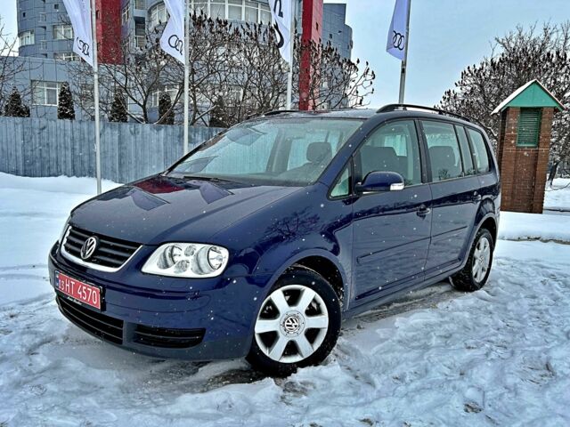 Синій Фольксваген Туран, об'ємом двигуна 1.6 л та пробігом 135 тис. км за 6199 $, фото 1 на Automoto.ua